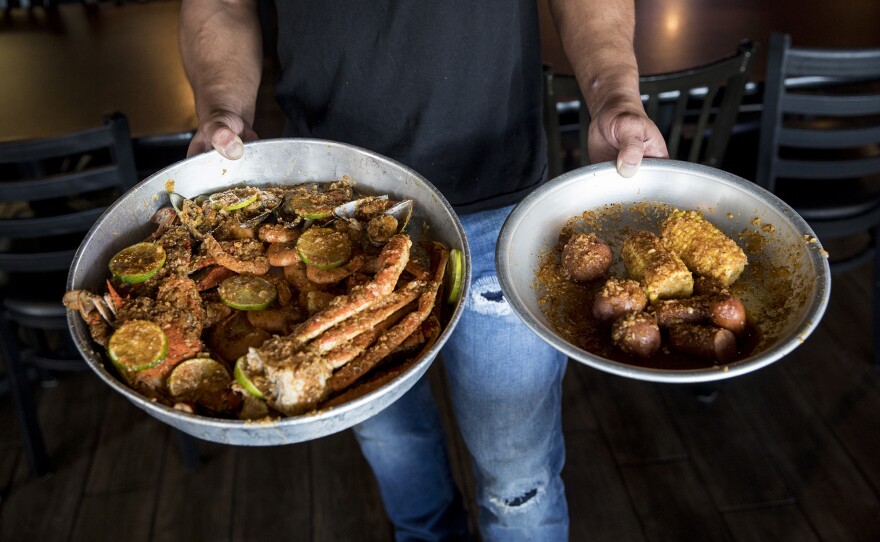 Mike Trinh serves Vietnamese-Cajun seafood, which is a food craze in Houston, at his restaurant, Mike's Seafood.