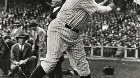 Baseball legend Babe Ruth at bat.