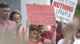 People protest SB277, a measure requiring California schoolchildren to get vaccinated, at a Capitol rally, June 9, 2015, in Sacramento.