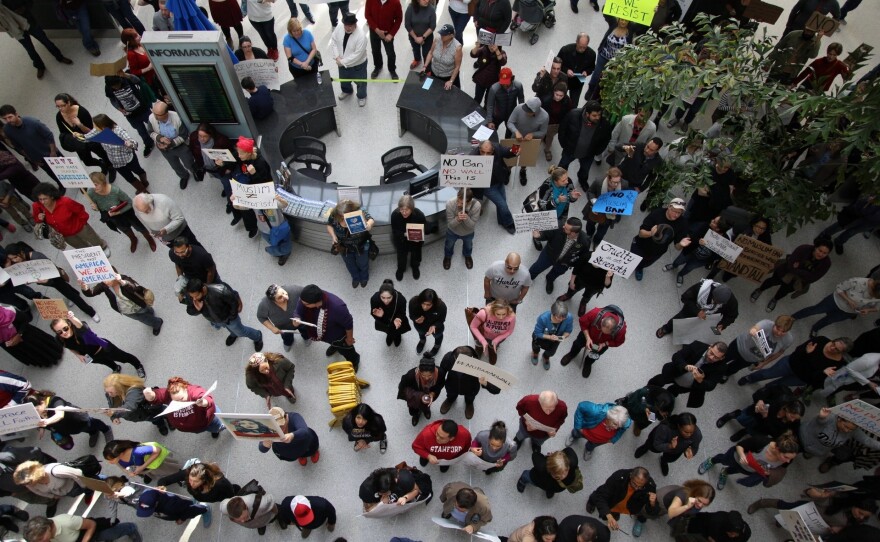 By 1 p.m. Sunday, roughly 300 people had gathered at Sacramento International Airport in northern California to protest Trump's executive order on immigration.