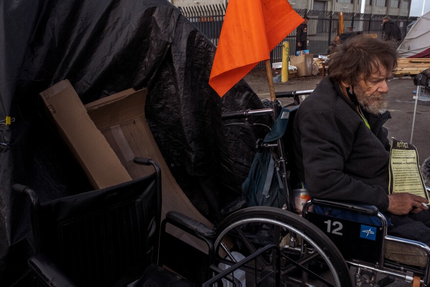 Wyatt Earp is shown here in San Diego's Midway district. Earp says he has been experiencing homelessness for 35 years. He lives in a tent on Sports Arena Boulevard just east of Rosecrans. Feb. 1, 2022.