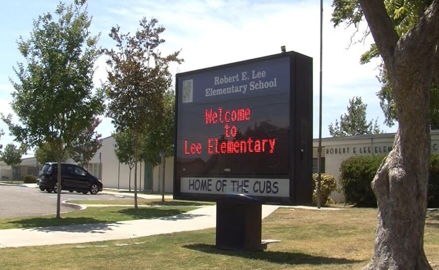 A sign outside Robert E. Lee Elementary School is pictured, June 22, 2015.
