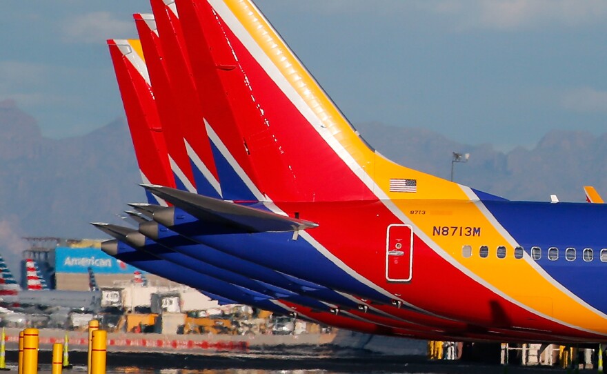 Southwest Airlines Boeing 737 Max aircraft sit on the tarmac at Phoenix Sky Harbor International Airport on March 13. The 737 Max has been grounded worldwide following a pair of deadly crashes.