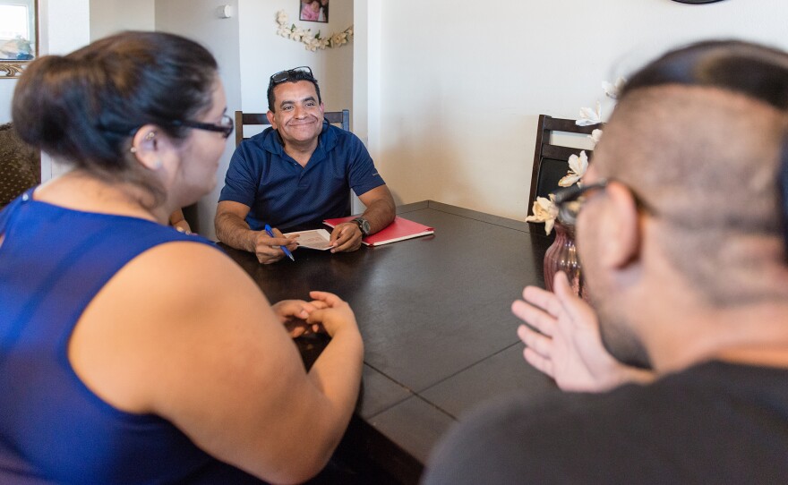 Rosendo Gil, a family support worker with the Imperial County, Calif., home visiting program, has visited Blas Lopez and his fiancée Lluvia Padilla dozens of times since their daughter was born three years ago.