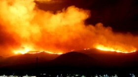 U.S. Marines and fire crews at Marine Corps Base Camp Pendleton battle wildfires at night, May 14, 2014.