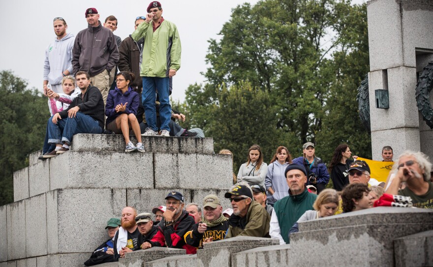 A crowd calls for an end to the government shutdown and the reopening of national memorials, at the World War II Memorial in Washington, D.C., on Sunday.