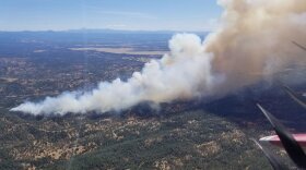 This photo provided by Cal Fire shows an aerial view of the Mountain Fire burning Thursday, Aug. 22, 2019, near Redding, Calif. 