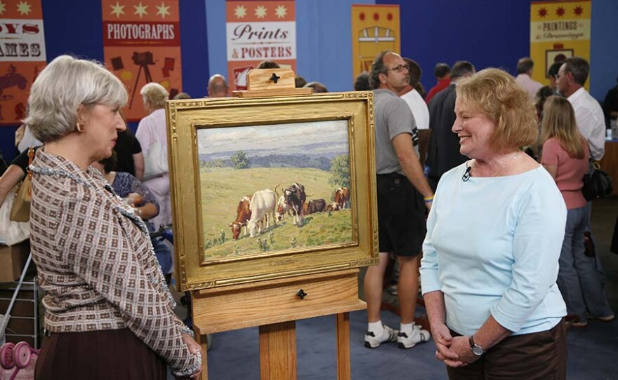 Colleene Fesko (left) appraises a 1927 Edward Volkert "Avon Hills Pasture" oil in Louisville, Ky. ANTIQUES ROADSHOW “Vintage Louisville 2021, Hour 1” premieres Monday, March 22 at 8/7C p.m. on PBS.