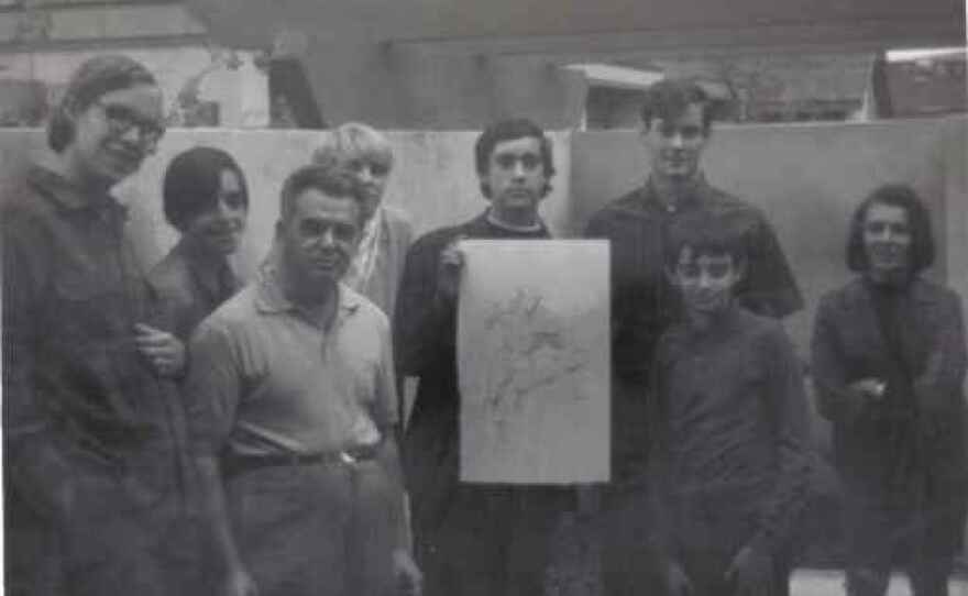 Convention committee members visit Jack Kirby (third from left) at his home in November 1969. Mike Towry is visible in the back, behind Kirby.