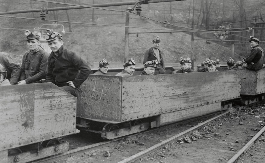 Coal miners return to work near St. Clairsville, Ohio, after a month's shutdown during union contract negotiations in May 1941. For decades, coal has fueled the economy in Belmont County, where St. Clairsville is located, and beyond.