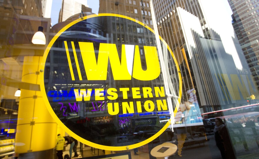 Western Union says the $586 million it will pay as part of a settlement will go to the federal government.