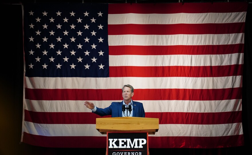 Georgia Republican Gov. Brian Kemp speaks during a campaign rally on the eve of the primary for governor, on Monday in Kennesaw, Ga.