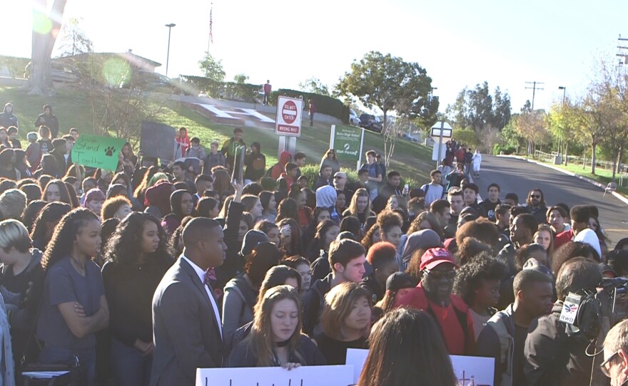 Students walk out in protest at Helix High School following the release of a video over the weekend showing a La Mesa police officers slamming a female student to the ground, La Mesa, Jan. 22, 2018. 