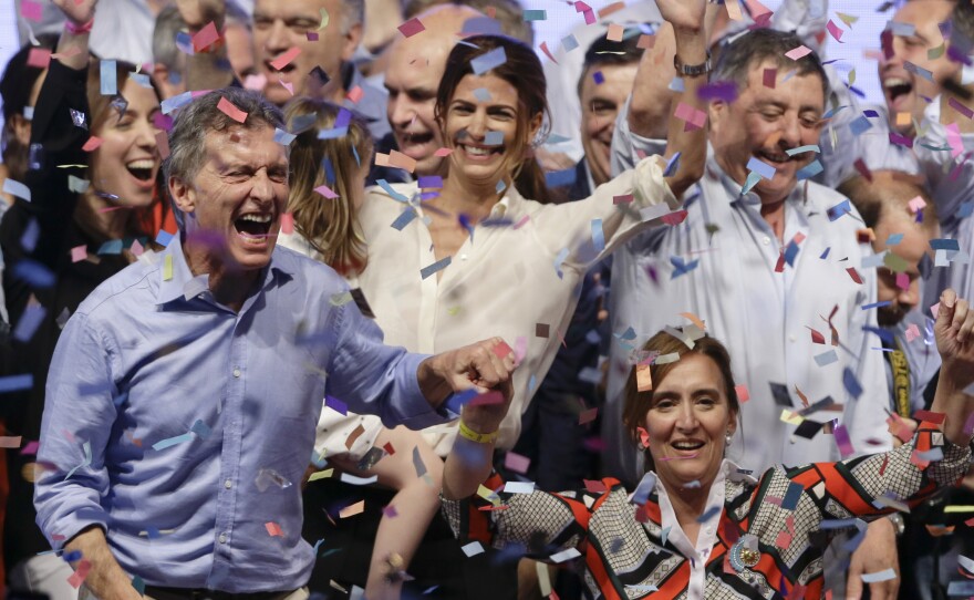 Opposition presidential candidate Mauricio Macri, left, and running mate Gabriela Michetti celebrate after winning a runoff presidential election in Buenos Aires, Argentina, on Sunday.