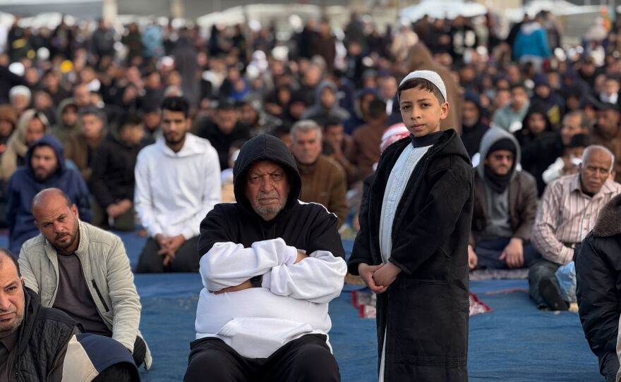 Palestinians gather in Gaza City to mark the end of Ramadan, the Muslim month of fasting, with Eid prayers. Israeli airstrikes prevented such gatherings last year and the year before during the war on Hamas.