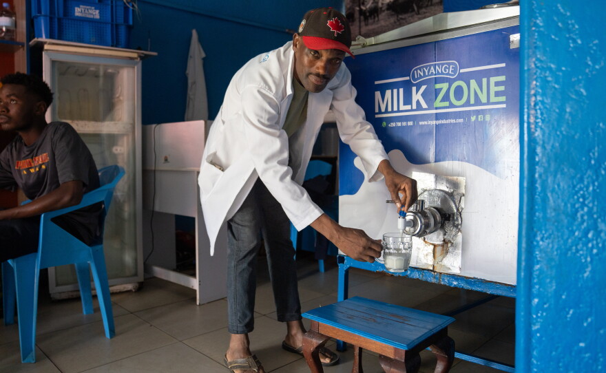 Moses Sansiman taps into cold whole milk at his milk bar. Some milk bars offer a variety of flavors but Sansiman says he likes to keep it simple.