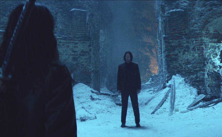 Ana de Armas as Eve and Keanu Reeves as John Wick in "Ballerina." (2025)