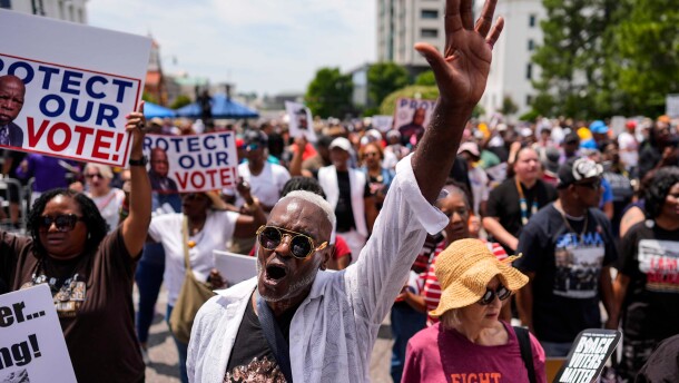 A man sings a spirtual song during a voting rally, Saturday, May 16, 2026, in Montgomery, Ala.