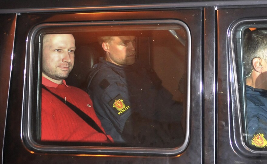 Anders Behring Breivik (left) exited an Oslo courthouse in an armored police vehicle following a hearing Monday at which he pleaded not guilty to one of the deadliest modern mass killings in peacetime.
