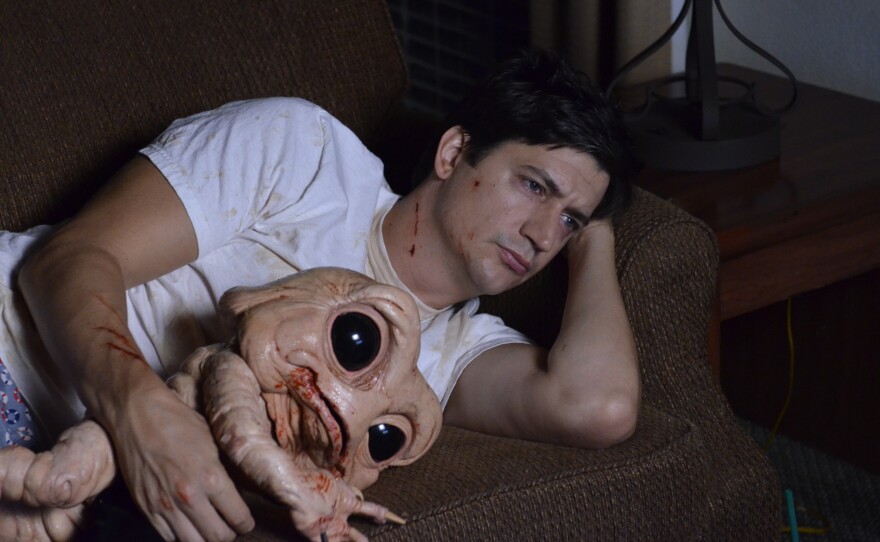 Ken Marino plays Duncan, a man who must come to terms with the id-like demon "Bad Milo" that emerges from his anus at times of stress.