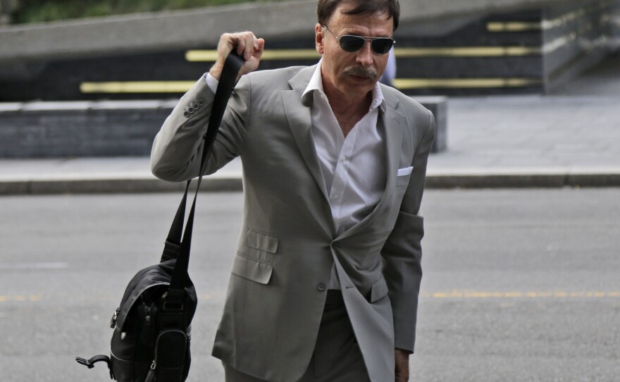 St. Louis Rams owner Stan Kroenke arrives at a hotel where NFL meetings were taking place in New York, Oct. 7, 2014.