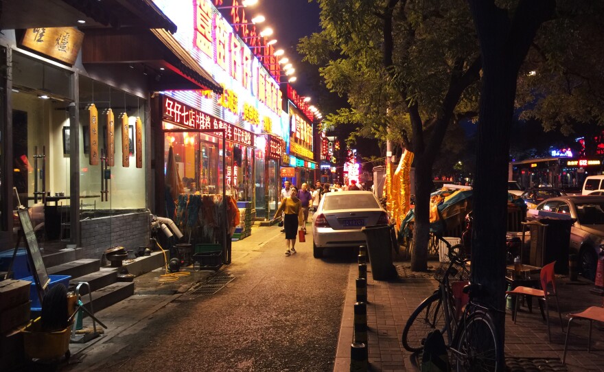 Restaurants stay open late into the night on Beijing's Dongzhimennei Street, including A Very Long Time Ago, which reintroduced the practice of tipping waitstaff last October.