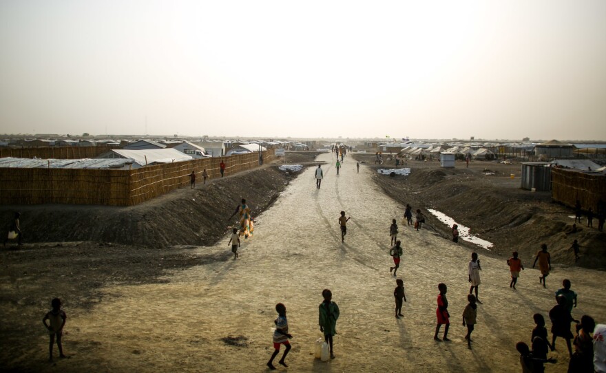 A dirt road cuts through a sprawling Doctors Without Borders camp in South Sudan. In a letter, 1,000 current and former employees are accusing the aid group of racism and white supremacy.