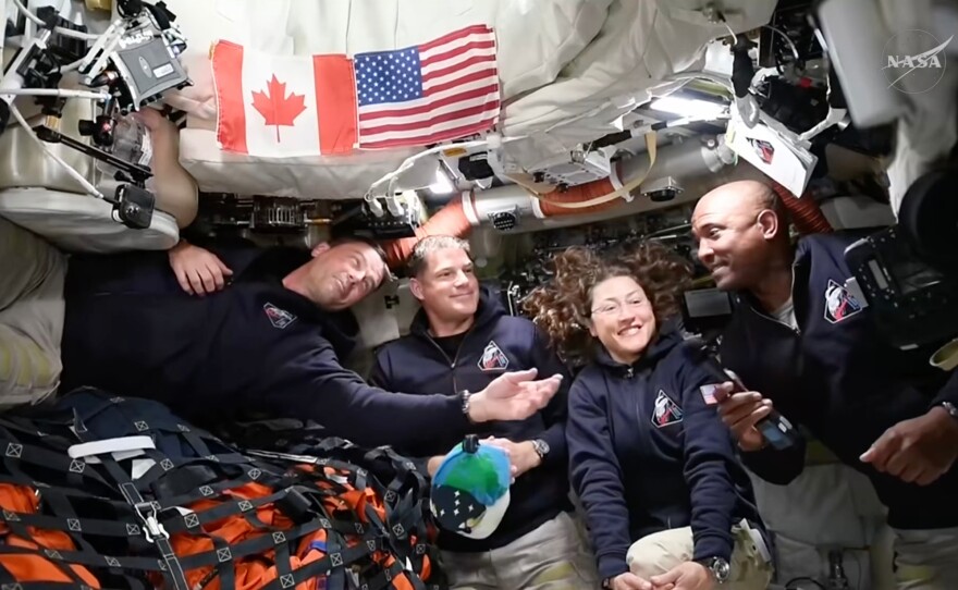 April 4: Artemis II astronauts (from left) Reid Wiseman, Jeremy Hansen, Christina Koch and Victor Glover gather for an interview en route to the moon.