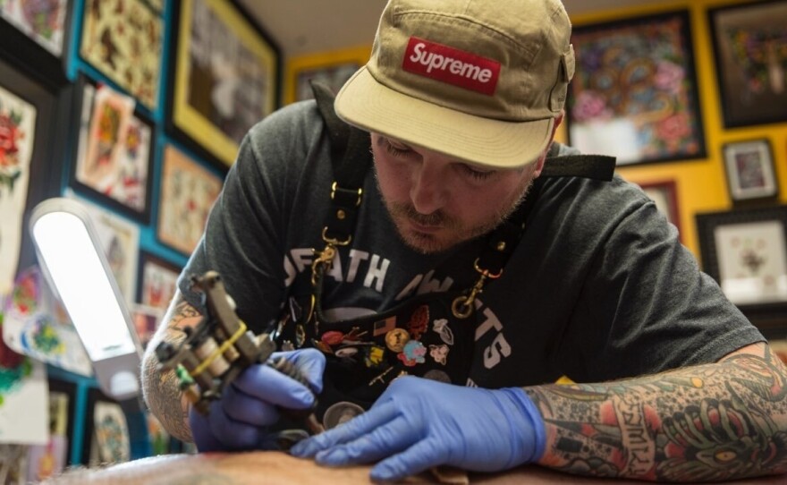 Billy White, owner of Red Rose Tattoo in Zanesville, Ohio, will cover up people's previous racist tattoos. But first he ensures it reflects a genuine change in ideology. He's seen more interest in covering up tattoos this year than before.