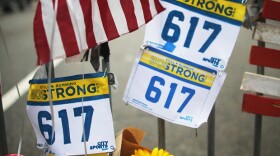 Items are attached to a fence at a makeshift memorial for victims near the site of the Boston Marathon bombings a day after the second Boston bombing suspect was captured on April 20, 2013. FRONTLINE investigates whether the hundreds of billions of dollars spent since September 11 on counterterrorism efforts in America have made us safer.