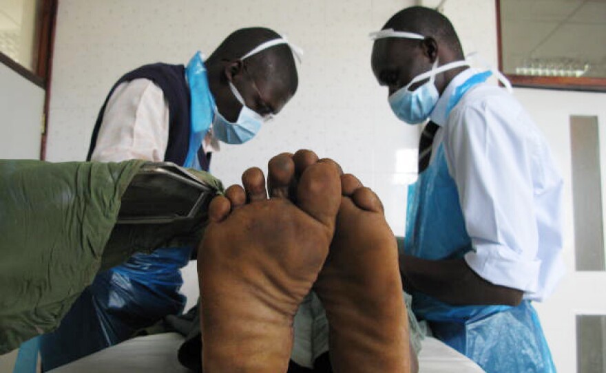 Joseph Ochieng, 18, gets circumcised at the Siaya General Hospital in western Kenya.
