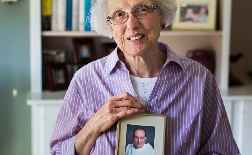 Eve Farrell holds a portrait of her husband, Daniel, in her Port Angeles, Wash., home. He died in January of chronic obstructive pulmonary disease.