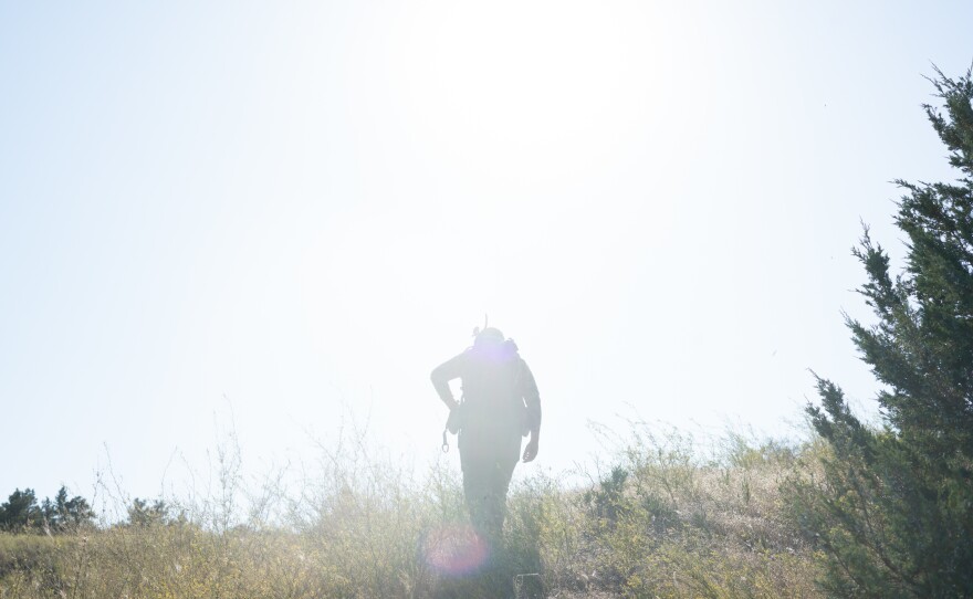 Justin Schaaf, a hunter and conservationist, scouts for elk in the Charles M. Russell National Wildlife Refuge.