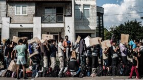 Refugees in Presevo, Serbia, who have just arrived from Macedonia and are waiting for their papers to be processed. “Exodus” tells first-person stories of refugees and migrants fleeing war and persecution for Europe, drawing on footage filmed by the families themselves as they leave their homes on dangerous journeys seeking safety and refuge.