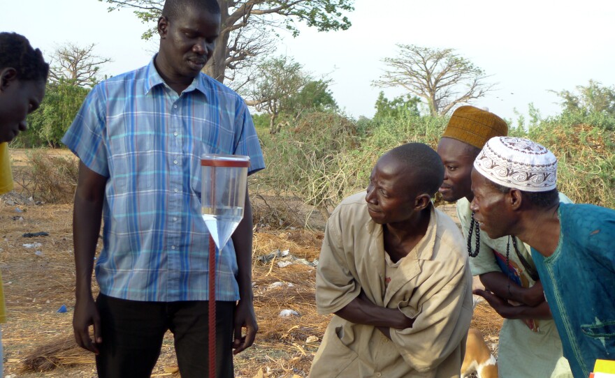 Farmers participate in a CGIAR climate training workshop on how to interpret seasonal rainfall forecasts in Kaffrine, Senegal.