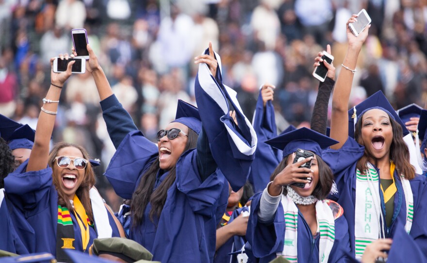 Howard University graduates celebrate at commencement in May 2016.