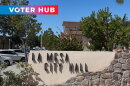 The Voter Hub logo is overlayed on the top left over a photo of a sign of La Mesa City Hall located on Allison Avenue. Photo taken Sept. 24, 2025.