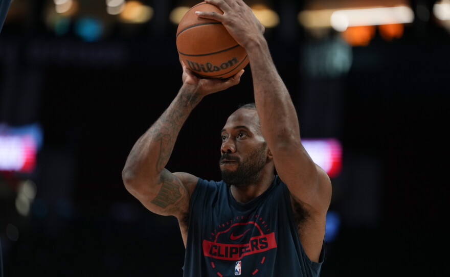 Los Angeles Clippers forward Kawhi Leonard warms up before an NBA basketball game April 10, 2026, in Portland, Ore.