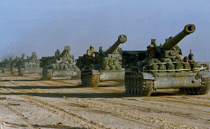 U.S. Army howitzers in Saudi Arabia heads toward the Kuwaiti border in 1991, part of the effort to drive the Iraqi military out of Kuwait. The U.S. military has been involved in Iraq almost non-stop for more than two decades.
