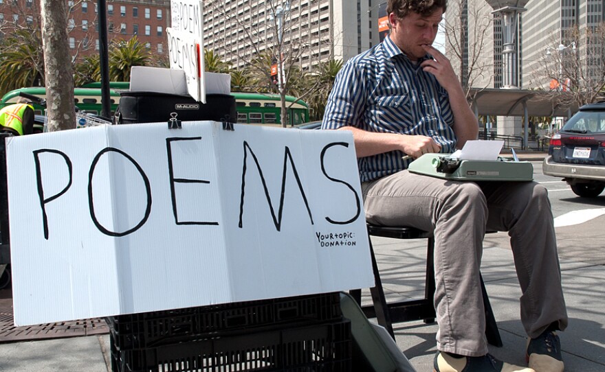 Poet-for-hire Zach Houston works at the Ferry Plaza Farmers Market in San Francisco. Houston says he is paid about $2 to $20 for each poem.
