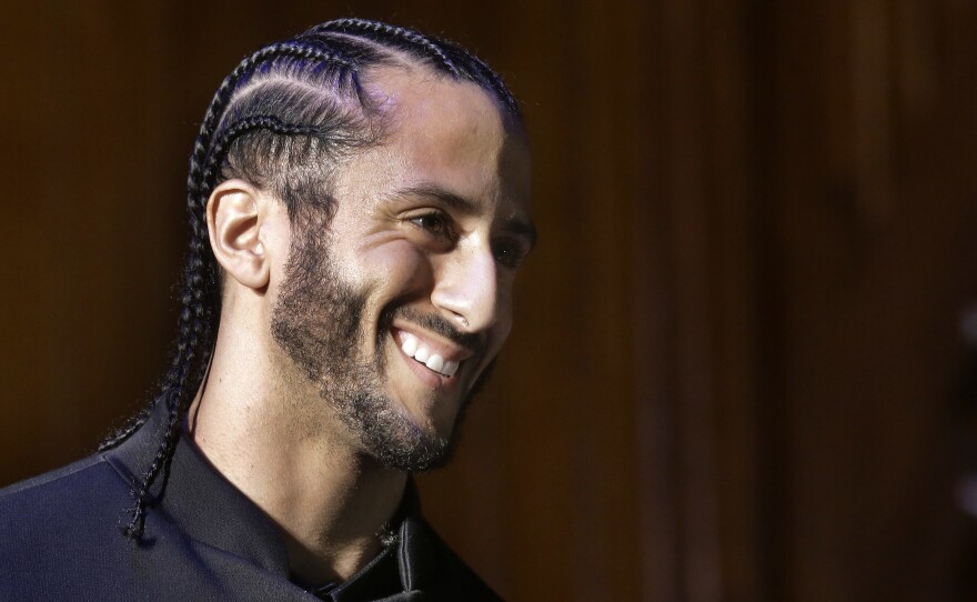 Former NFL quarterback Colin Kaepernick, pictured in 2018, has reached an agreement with the league over his allegations of collusion by teams.