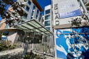 The CSUSM cougar logo is seen under signage for "The Quad" student housing, Oct. 9, 2026.