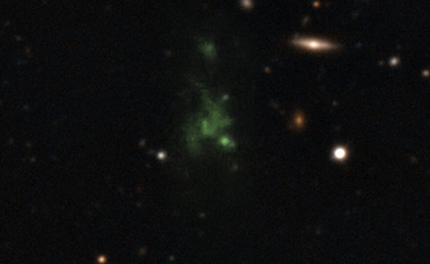 This composite image shows one of the largest known single objects in the universe, the Lyman-alpha blob LAB-1.