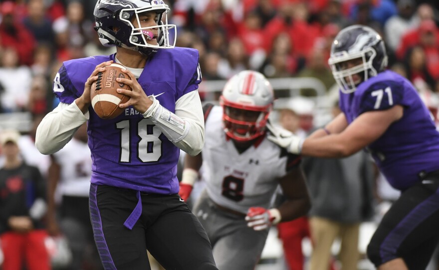 Gonzaga College Eagles quarterback Caleb Williams looks to pass during the WCAC football game between Gonzaga and St. John's College at Paint Branch High School on November 4, 2017.