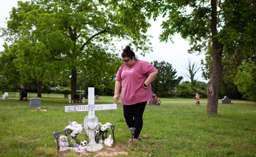 Zaira Gonzalez stands at the grave of her brother, Christian, near her home in Palestine, Texas. Christian died on ranch land in Brooks County, Texas, in September 2012 while crossing illegally into the U.S. from Mexico.