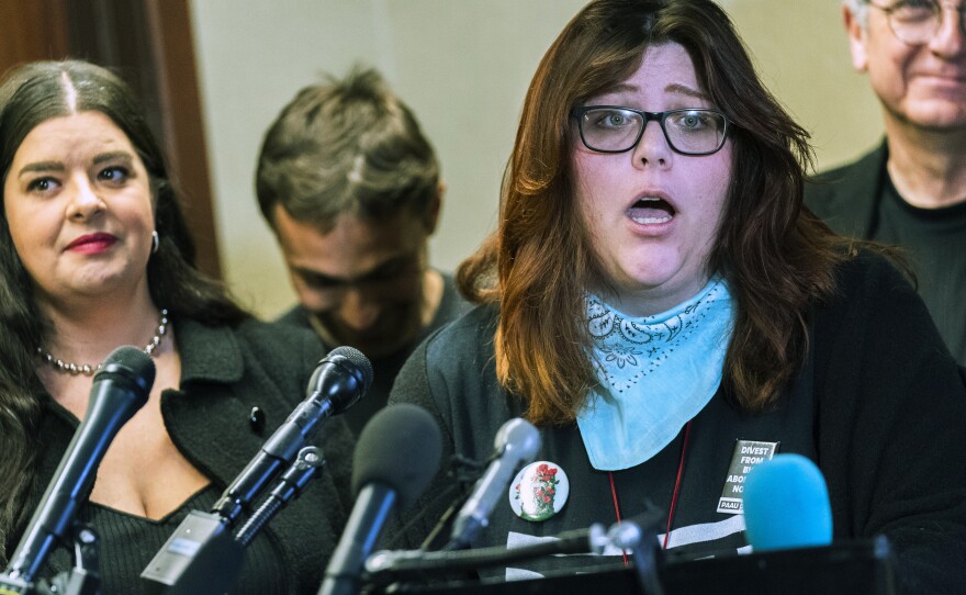 Anti-abortion activist Lauren Handy speaks during a news conference in Washington, D.C., on Tuesday. The anti-abortion group Progressive Anti-Abortion Uprising says it took 115 fetuses from a medical waste truck.