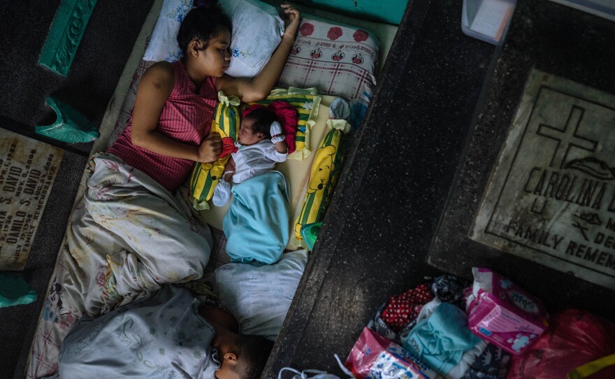 In 2017 at age 17, Ralyn Ramirez, her partner and their first child rest in a mausoleum at the Manila North Cemetery, where several thousand people live.