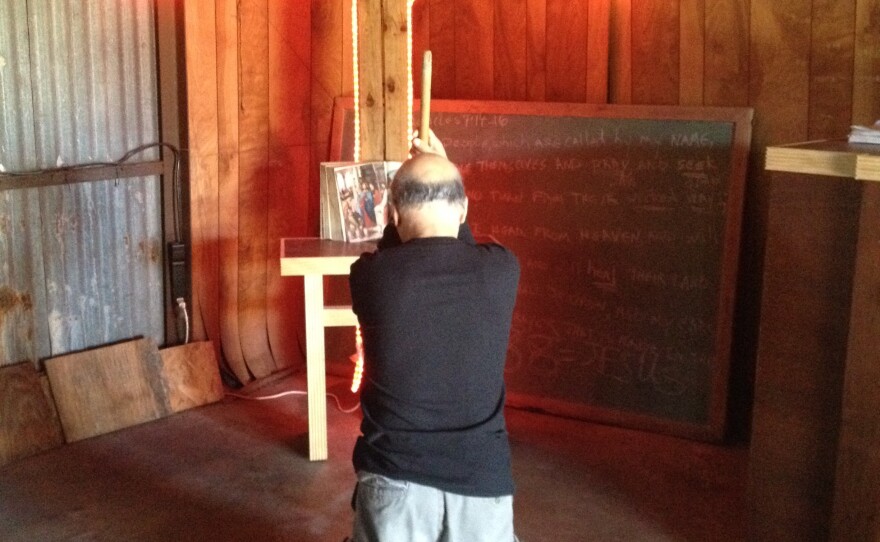 Bart Franco in the chapel next to his home in Houston.