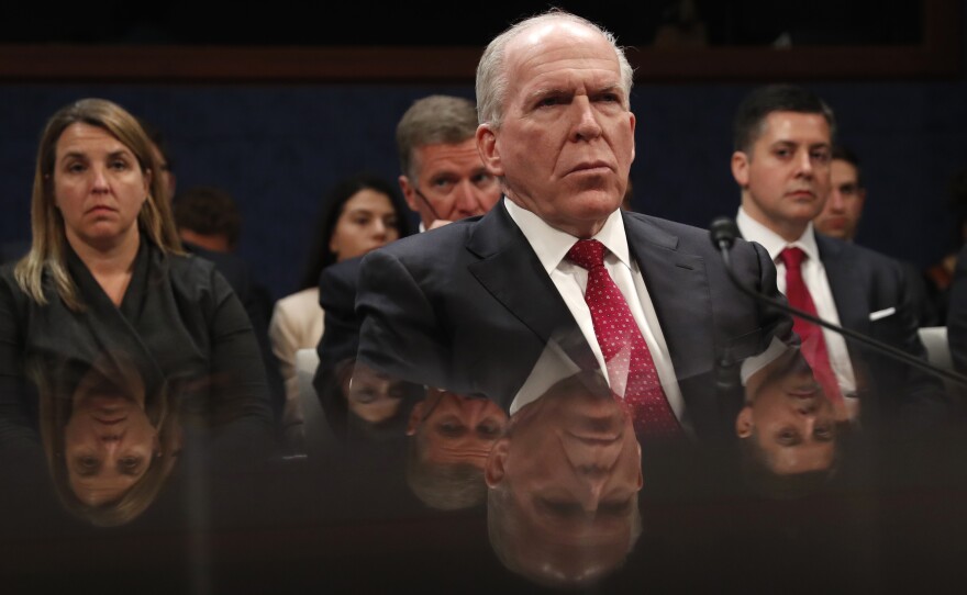 Former CIA Director John Brennan prepares to testify on Capitol Hill on Tuesday.