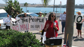 Opponents rally against Caruso's 85/15 Project, proposed for the Agua Hedionda Lagoon in Carlsbad, Aug. 20, 2015.